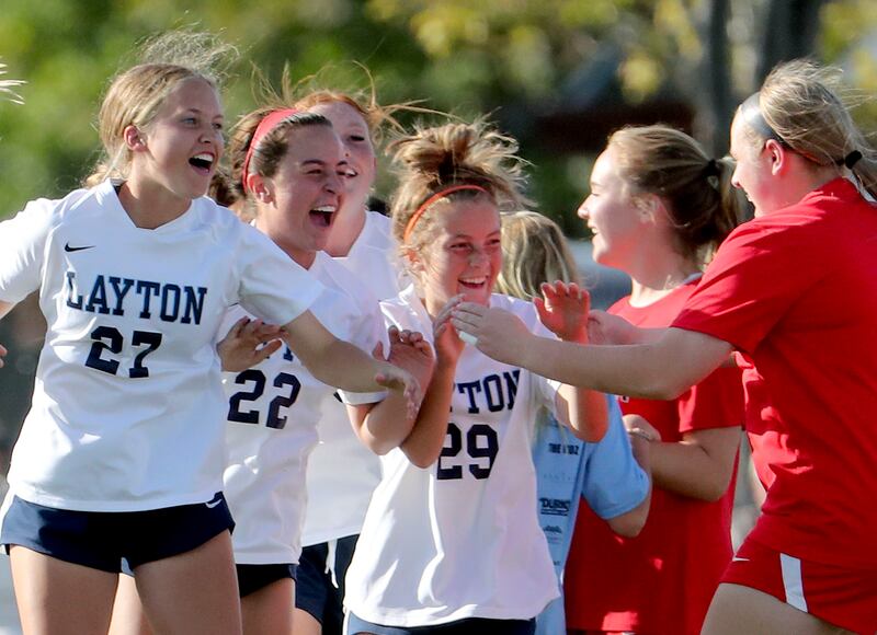 Layton players celebrate their win against Davis High at the Angel Street Soccer Complex in Kaysville on Thursday, Sept. 22, 2021.