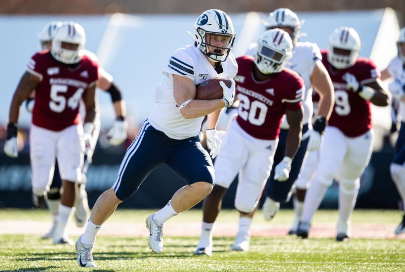 BYU running back Jackson McChesney heads upfield during game against UMass in 2019.