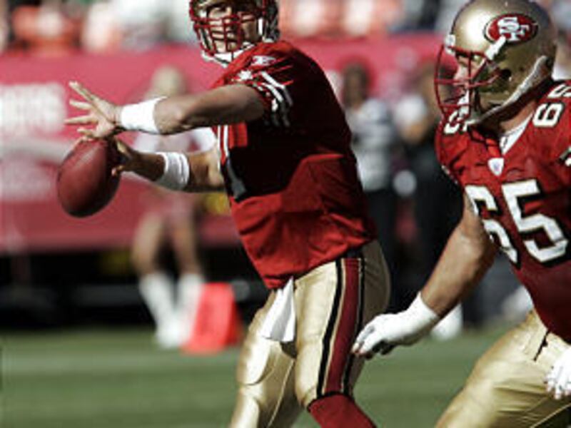 San Francisco quarterback Alex Smith prepares to pass during an exhibition game loss to the Denver Broncos on Monday night.