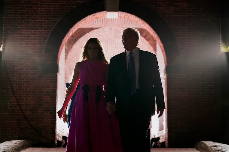 President Donald Trump walks with first lady Melania Trump on the third day of the Republican National Convention at Fort McHenry National Monument and Historic Shrine in Baltimore, Wednesday, Aug. 26, 2020