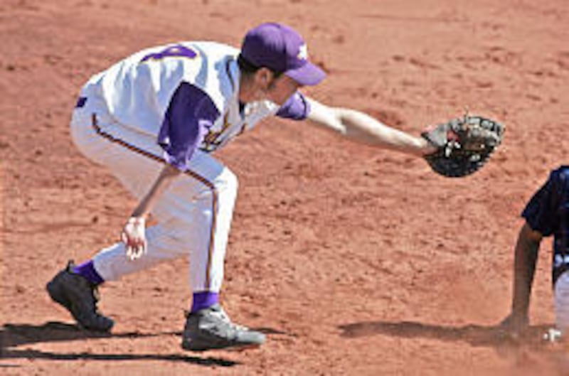 Wayne's Porter Ellett reaches for a tag against West Ridge Academy. Ellett, a junior, is this year's 1A high school baseball MVP.