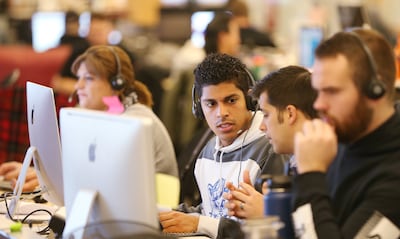 Qualtrics employee Aldredo Olsen works at the office in Provo on Feb. 2, 2018. Qualtrics is a global leader in the realm of customer experience analytics and was acquired Sunday for $8 billion.