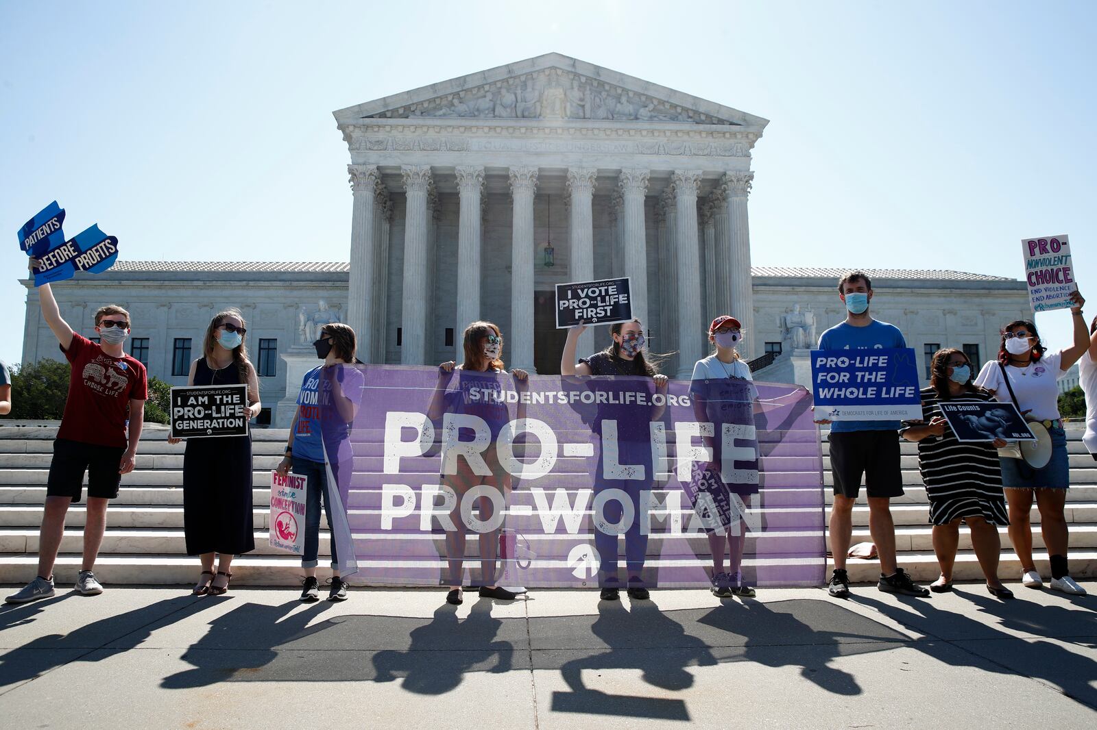 Anti-abortion protesters gather outside the Supreme Court building in Washington, D.C.