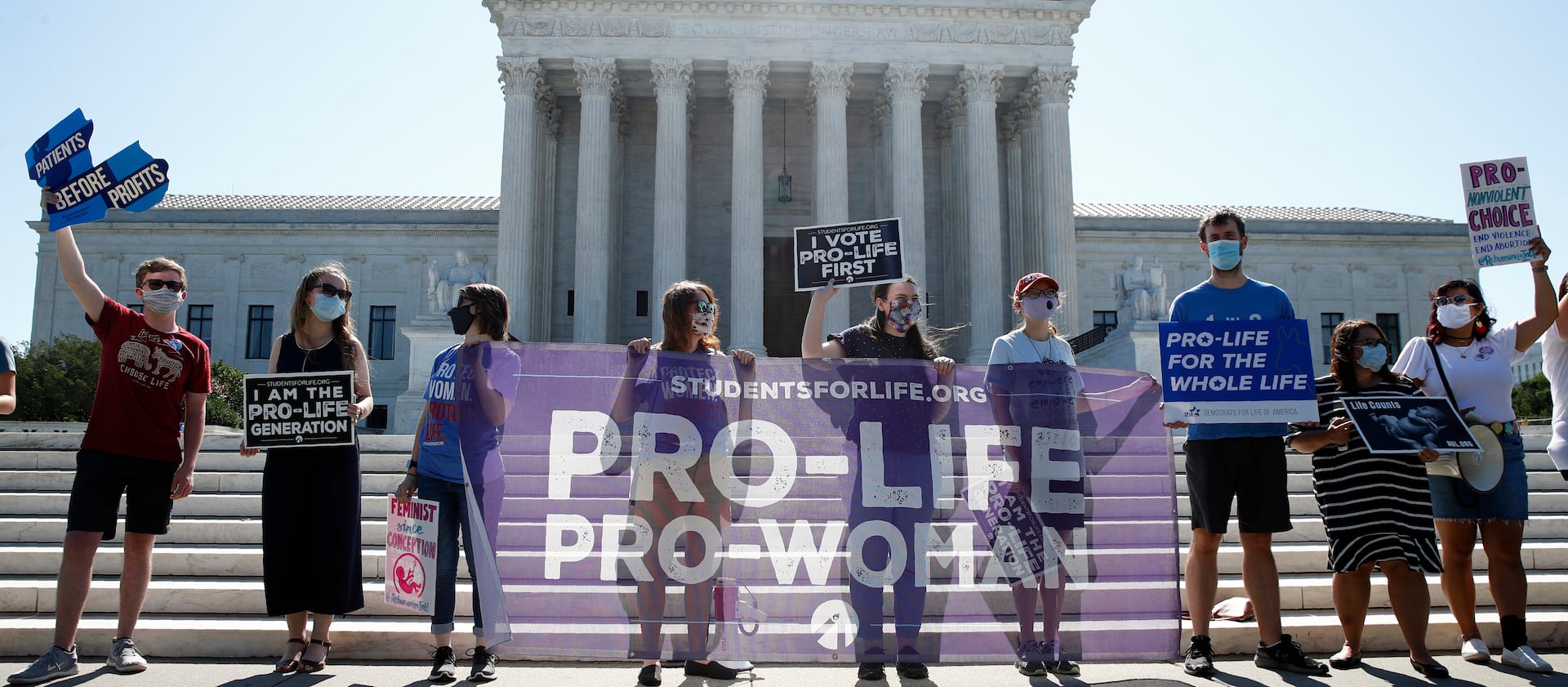 Anti-abortion protesters gather outside the Supreme Court building in Washington, D.C.
