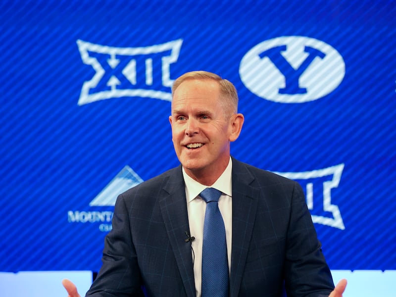 BYU athletic director Tom Holmoe speaks at a press conference announcing that BYU has accepted an invitation to the Big 12.