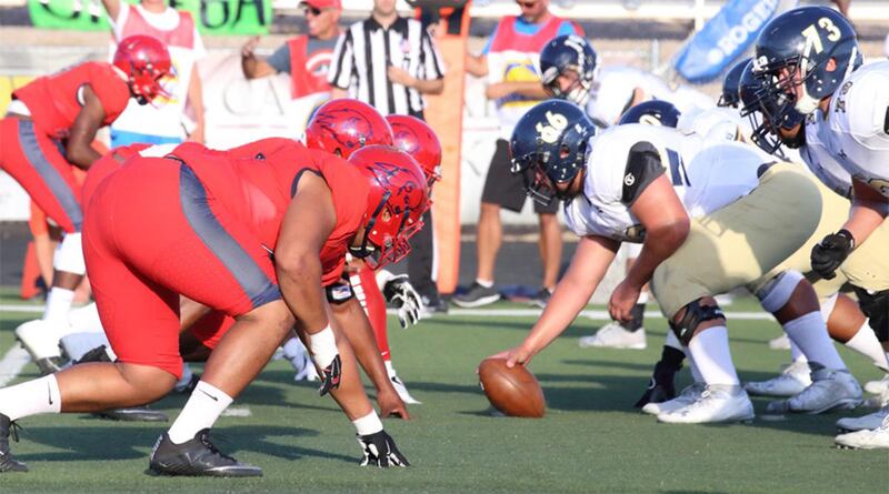 The Dixie State defense (left) lines up against South Dakota Mines in September 2016. The Trailblazers open their 2017 fall camp on Monday.