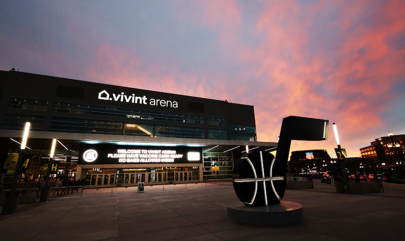 The sun sets behind Vivint Arena in Salt Lake City.