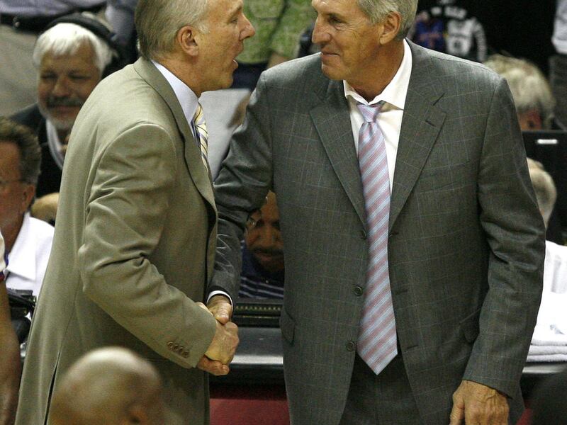 Spurs coach Gregg Popovich and Jazz coach Jerry Sloan shake hands after the Utah Jazz are defeated by the San Antonio Spurs in game 5 of the NBA Western Conference Finals in San Antonio, Texas, May 30, 2007. Photo by Tom Smart