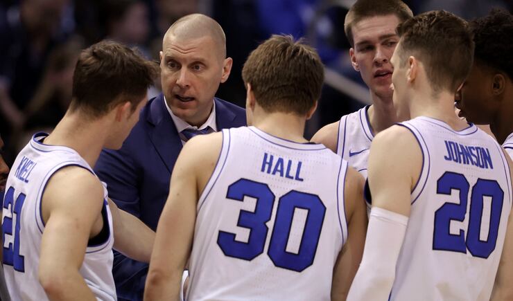 BYU’s head coach Mark Pope instructs his team during a timeout against the UCF Knights at the Marriott Center in Provo on Tuesday, Feb. 13, 2024.