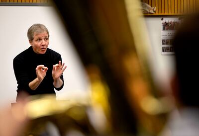 Thierry Fischer, music director of the Utah Symphony, directs the Cottonwood High School orchestra in Murray on Thursday, March 14, 2019. High school orchestras across the state are rehearsing the same piece and will perform with the SuperOrchestra via li