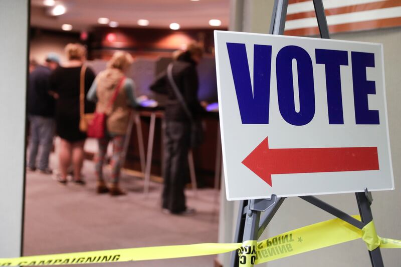 Voters cast their ballots early for the midterm elections at the Government & Judicial Center in Noblesville, Ind., Tuesday, Oct. 23, 2018.