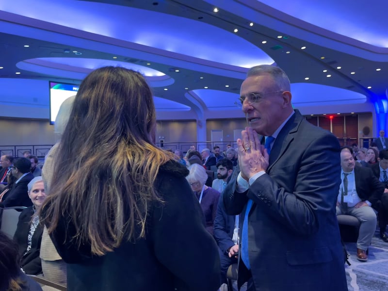 Elder Ulisses Soares speaks with a participant at IRF Summit 2025 in Washington, D.C., on Feb. 5, 2025.