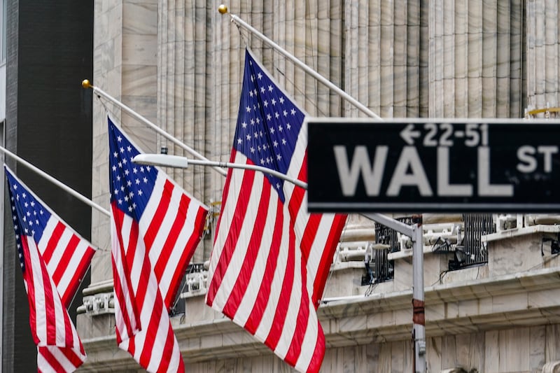 American flags hang outside of the New York Stock Exchange on Tuesday, Feb. 16, 2021.