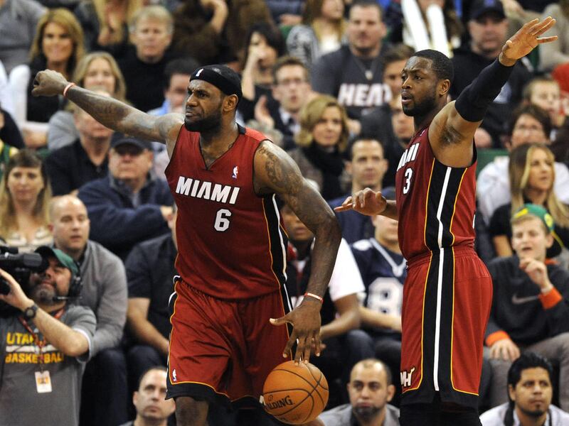 Miami Heat small forward LeBron James (6) and Miami Heat shooting guard Dwyane Wade (3) want an offensive foul call as James was called for the foul instead during a game at EnergySolutions Arena on Saturday, Feb. 8, 2014.