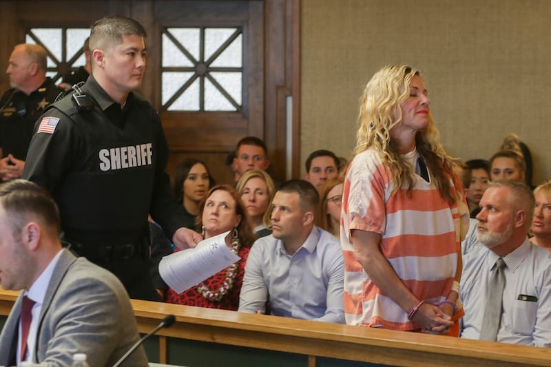Lori Vallow Daybell leaves the courtroom during her hearing on Friday, March 6, 2020, in Rexburg, Idaho. Daybell who is charged with felony child abandonment after her two children went missing nearly six months ago had her bond reduced to $1 million by an Idaho judge on Friday. (John Roark/The Idaho Post-Register via AP, Pool)