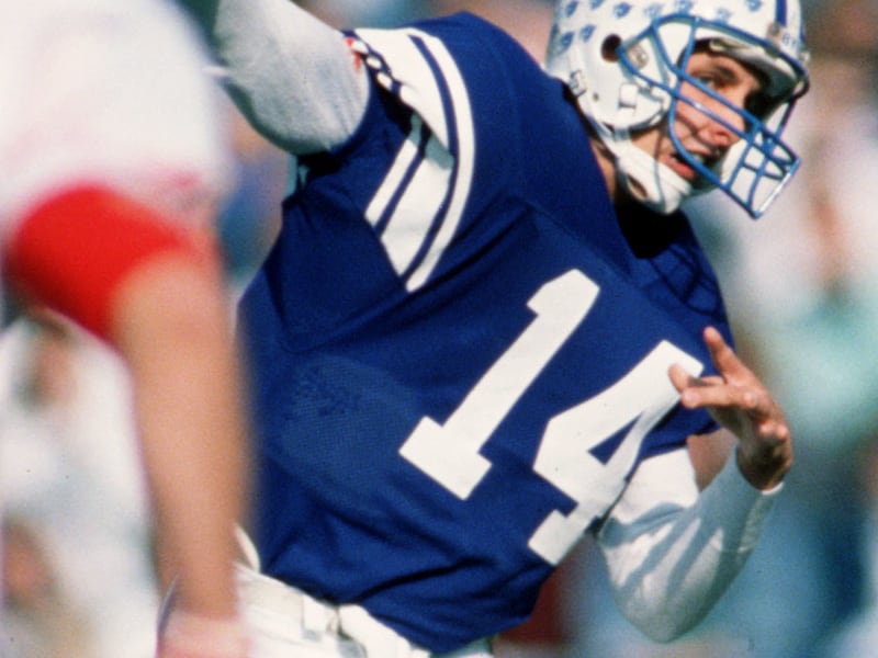 BYU quarterback Ty Detmer delivers a pass during game against Utah, November 1989.