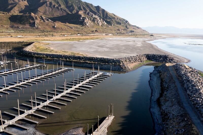 The Great Salt Lake boat docks are empty, and much of the lakebed nearby is exposed from receding water.
