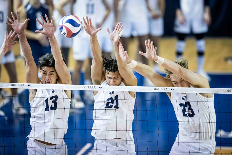 BYU volleyball attempt to block a shot during match against Ball State on Jan. 6, 2024, at the Smith Fieldhouse in Provo, Utah.