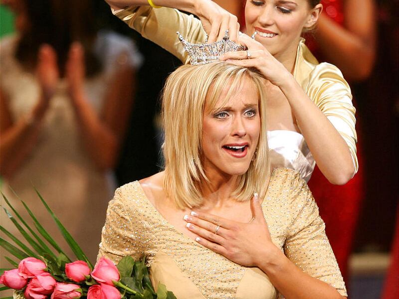 Jill Stevens is crowned Miss Utah Scholarship Pageant winner by 2006 winner Katie Millar at the Capitol Theatre June 29, 2007, in Salt Lake City.