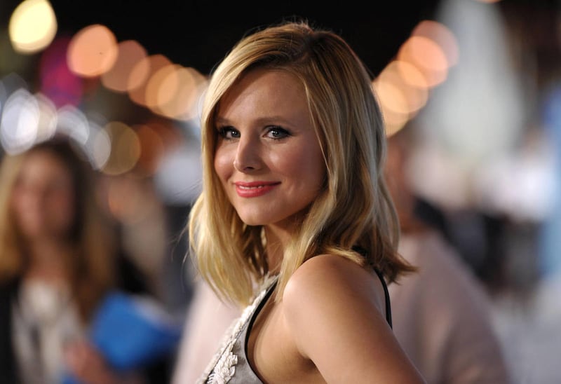 Kristen Bell attends the world premiere of “Frozen,” on Tuesday, Nov. 19, 2013, in Los Angeles. The UCLA football team and coach Jim Mora will join Bell in serving Thanksgiving dinner at the Pink Taco restaurant on the Sunset Strip.