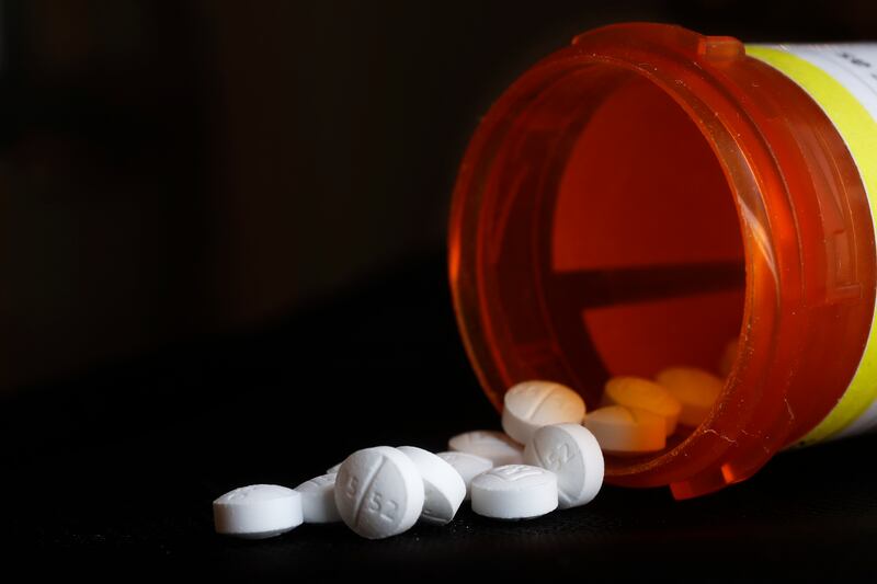 This Aug. 29, 2018, file photo shows an arrangement of Oxycodone pills in New York. A new study shoots down the notion that medical marijuana laws can prevent opioid overdose deaths. Chelsea Shover of Stanford University School of Medicine and colleagues
