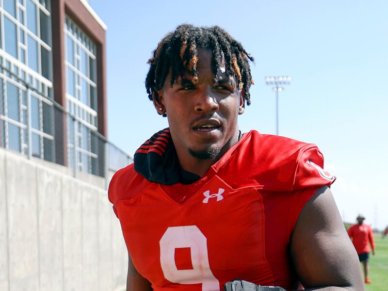Former Utah football player Tavion Thomas the media outside of the Spence and Cleone Eccles Football Center.