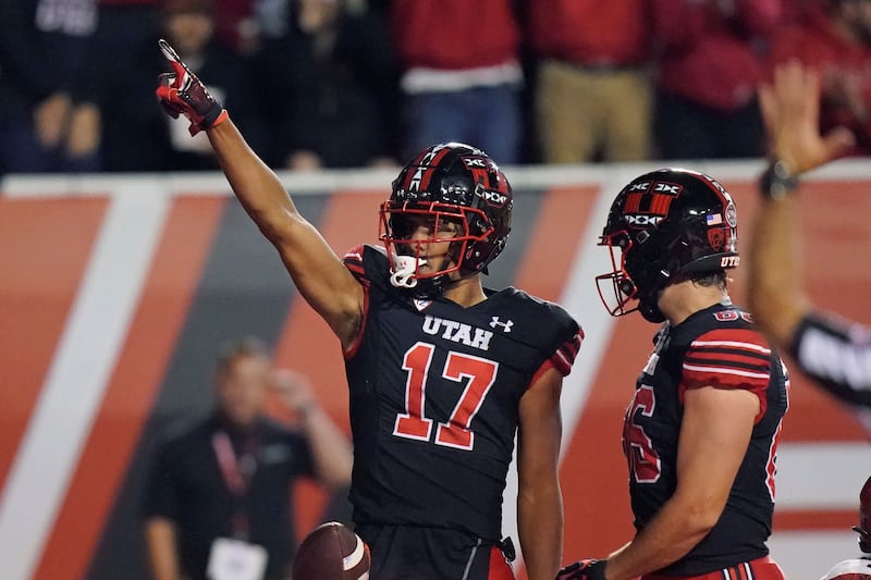 Utah receiver Devaughn Vele celebrates after scoring against San Diego State n Sept. 17, 2022, in Salt Lake City.