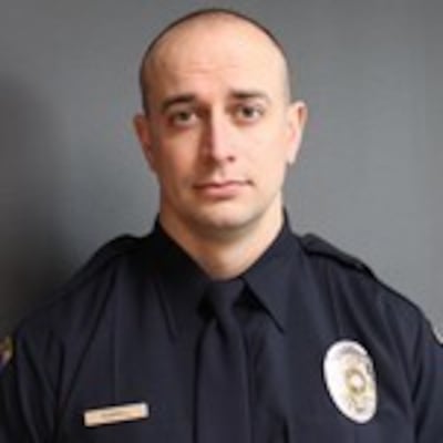 A South Salt Lake police officer died Saturday evening after he was struck by a vehicle during a confrontation with two burglars, one of whom was shot and killed by police, investigators said.