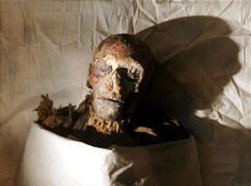 The mummy of Pharaoh Queen Hatshepsut is displayed at the Egyptian museum in Cairo, Egypt. Egyptian authorities using DNA from a tooth identified Wednesday a mummy found a century ago.