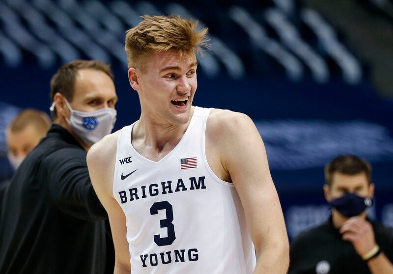 Brigham Young Cougars forward Matt Haarms (3) smiles after scoring two of his 23 points in the game against Portland.