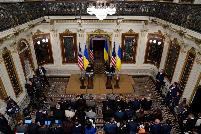 President Joe Biden and Ukrainian President Volodymyr Zelenskyy hold a news conference in the Indian Treaty Room in the Eisenhower Executive Office Building on the White House Campus, Tuesday, Dec. 12, 2023, in Washington.