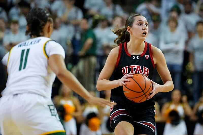 Utah’s Isabel Palmer, right, works the floor against Baylor’s Jada Walker during a college basketball game on Nov. 14, 2023.