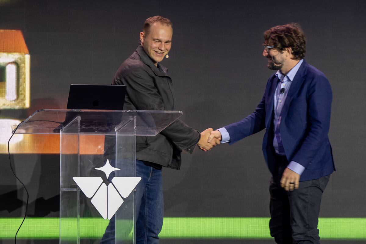 Valar Atomics Isaiah Taylor and NVIDIA's Levi Patterson on stage in Orangeville