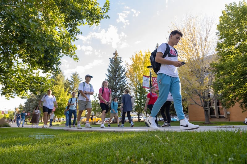 Students walking on campus.