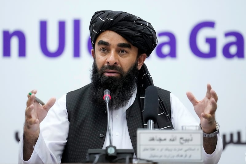 Zabiullah Mujahid, the spokesman for the Taliban government, speaks during a press conference.