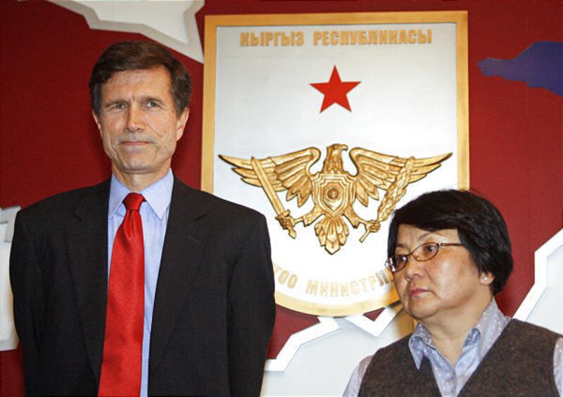 U.S. Assistant Secretary of State Robert Blake, left, and Kyrgyz Interim Leader Roza Otunbayeva at a news conference in Bishkek, Kyrgyzstan, Wednesday.
