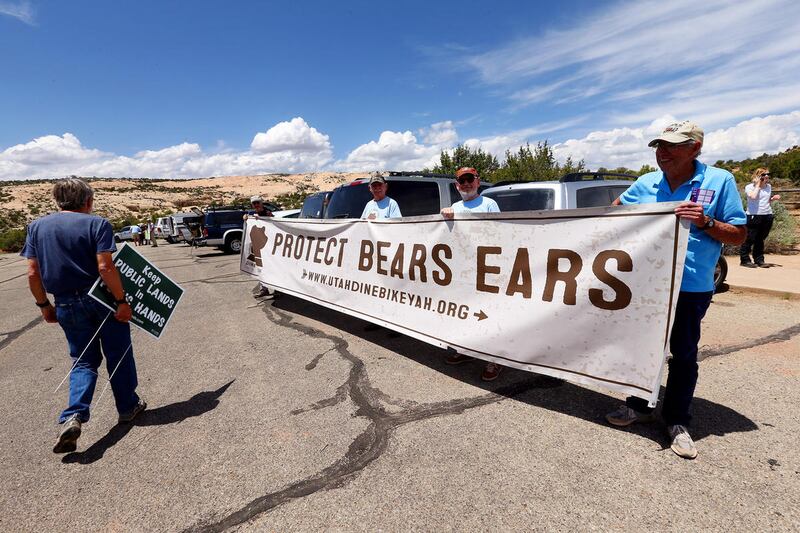Monument supporters wait for Interior Secretary Ryan Zinke and others hike to arrive in the Butler Wash area of the Bears Ears National Monument for a short hike to view ancient ruins on Monday, May 8, 2017.