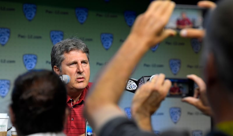 FILE: Washington State head coach Mike Leach speaks at the Pac-12 NCAA college football media day, Thursday, July 27, 2017, in the Hollywood section of Los Angeles.