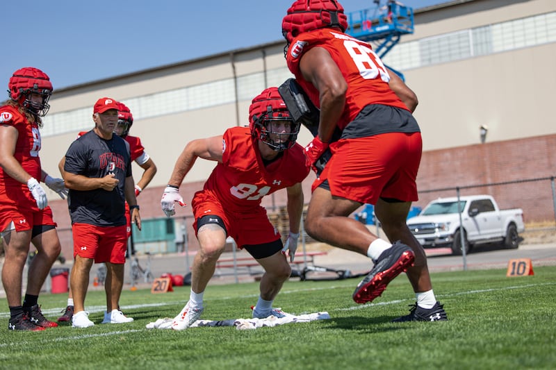 Former BYU and Baylor basketball player Caleb Lohner goes through drills during fall camp at the University of Utah in Salt Lake City. The former college basketball player not only changed schools, but sports too.