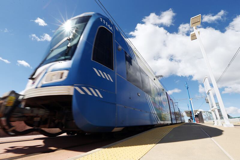 FILE - A TRAX train moves through Salt Lake City on Tuesday, April 4, 2017. UTA buses will service Fashion Place, Bingham Junction and Historic Gardner TRAX stops along the Red Line Saturday and Sunday as a portion of the route will be closed for construc
