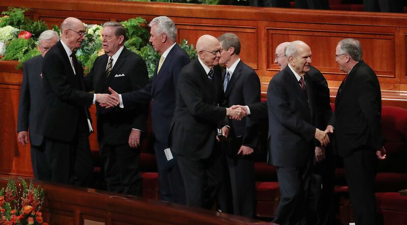 President Russell M. Nelson of The Church of Jesus Christ of Latter-day Saints, right, and his counselors, President Dallin H. Oaks, first counselor in the First Presidency, center, and President Henry B. Eyring, second counselor in the First Presidency,