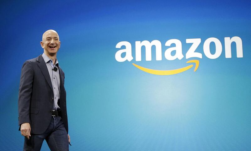 FILE - In this June 16, 2014, file photo, Amazon CEO Jeff Bezos walks onstage for the launch of the new Amazon Fire Phone, in Seattle. Bezos offered a glimpse of his vision for the future during an interview on May 31, 2016, at the Code Conference in Ranc