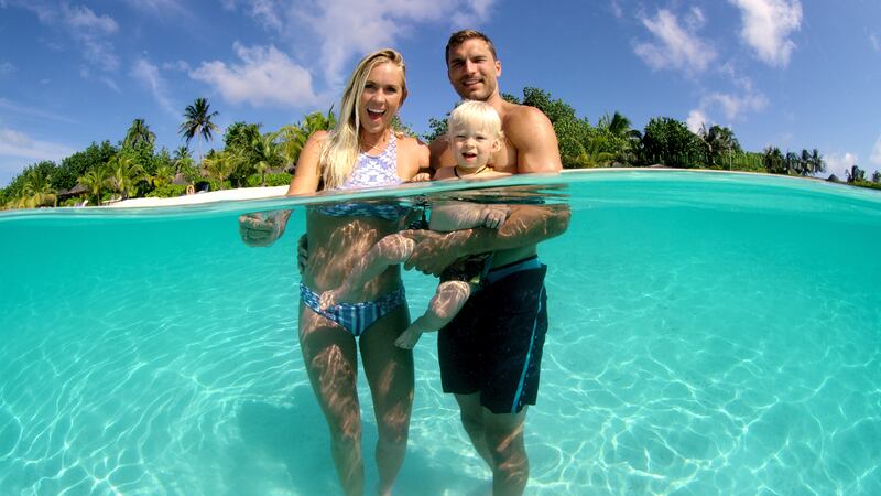 Bethany, Adam and their son Tobias in the Maldives, from “Bethany Hamilton: Unstoppable.”