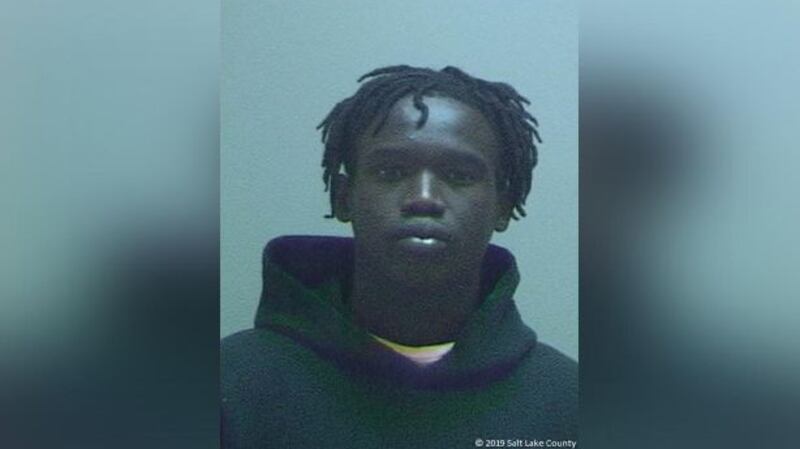 Buk Mawut Buk has been charged with aggravated murder in the shooting death of University Utah football player Aaron Lowe.