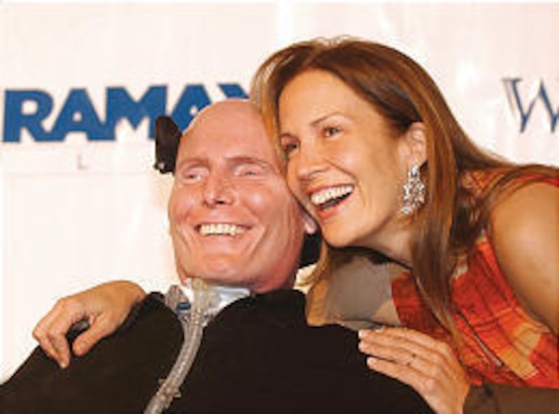Dana Reeve, with her late husband, Christopher, in 2003, died Monday at 44. Like her husband, she fought for a cure of paralysis.