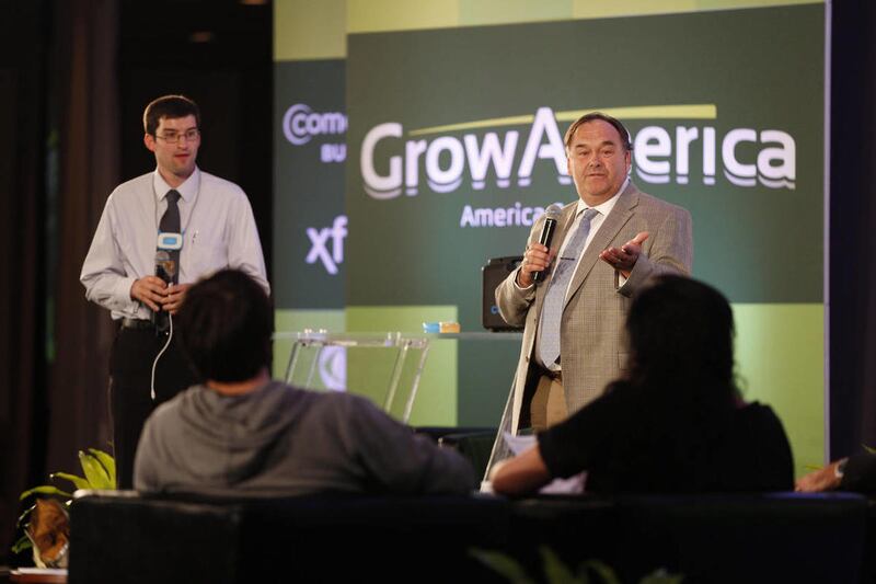 CompleteSpeech's Dan Smith, left, and David Larsen give their sales pitch to a panel of celebrity judges and the audience in the Grow America Live Springboard event at the Salt Palace in Salt Lake City, Utah, Monday May 21, 2012.