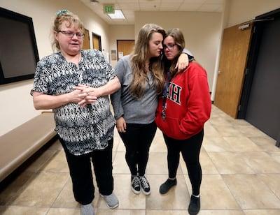 Sue Bryan talks about her daughter, Jchandra Brown, as Brown's friend's Grace Jackson and Hannah Baldt hug after the hearing for Tyerell Joe Przybycien, who pleaded guilty for child abuse homicide, in 4th District Court in Provo on Tuesday, Oct. 23, 2018.