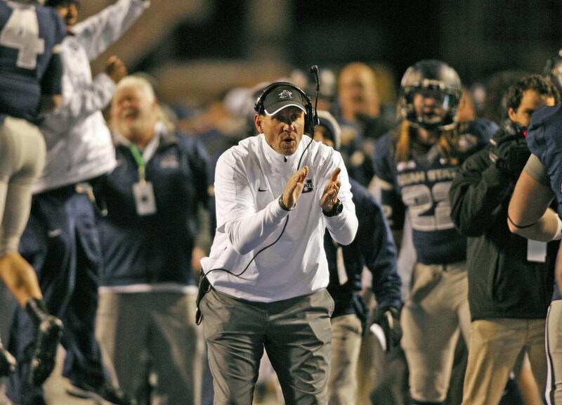 USU Coach Gary Andersen urges his team on as Utah State University defeats Toledo 41-15 as they play football in the Famous Idaho Potato Bowl Saturday, Dec. 15, 2012,in Boise, Idaho.