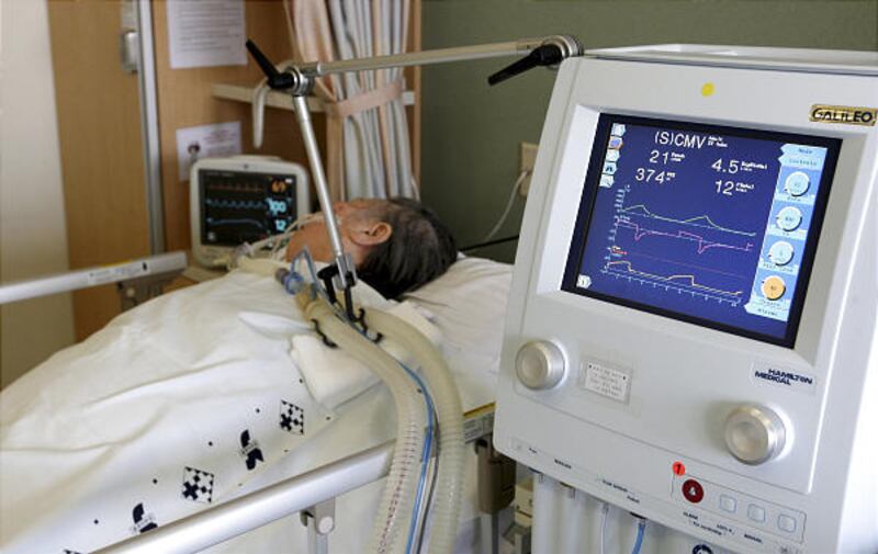A South Korean female patient, 76, known only by her last name Kim, lies in a bed before removing life supports at the Severance Hospital in Seoul, South Korea, Tuesday.