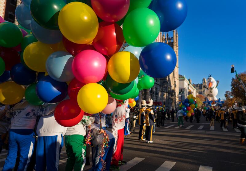 Participants take their place along the parade route before the Macy’s Thanksgiving Day Parade begins in New York, Thursday, Nov. 23, 2017.